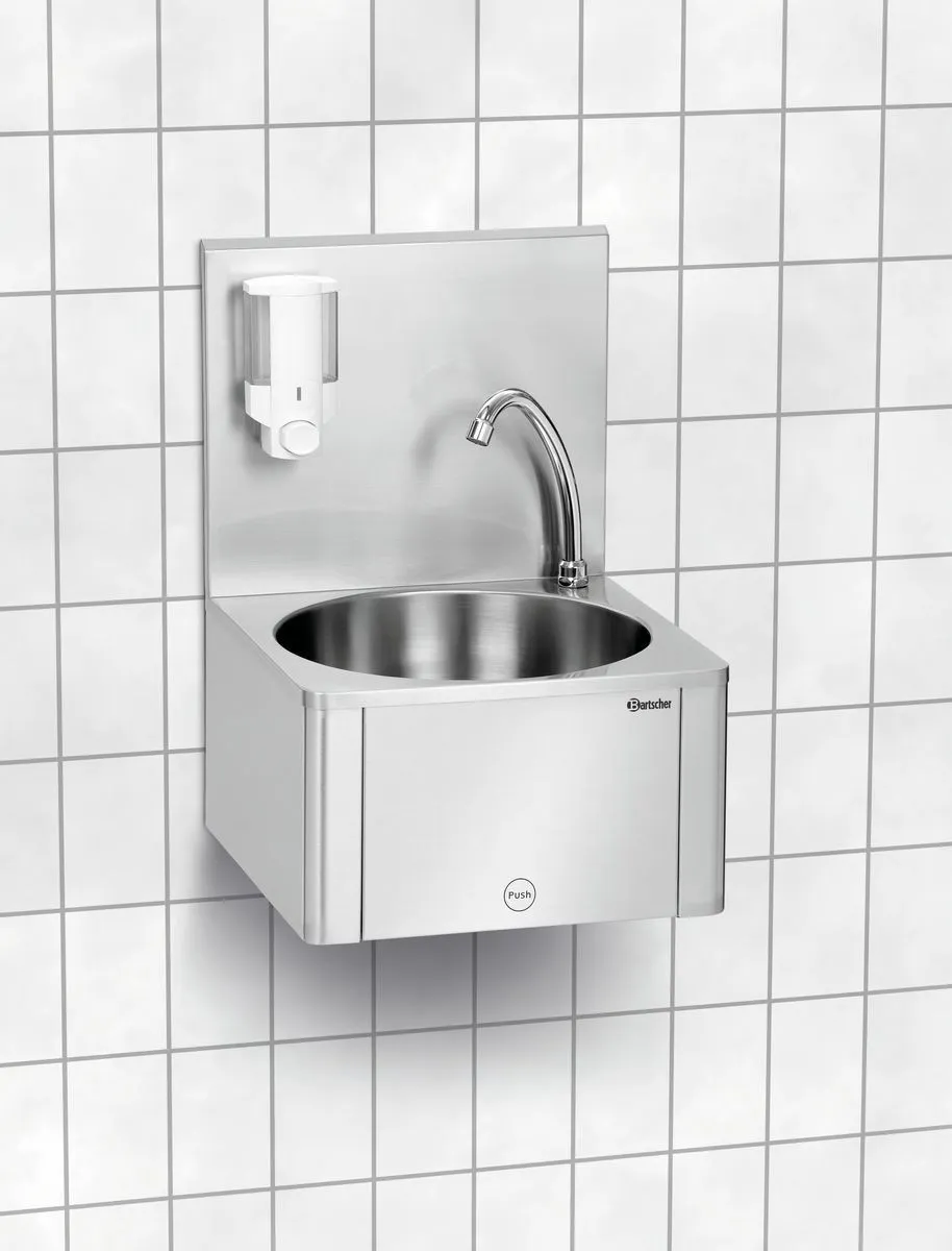Femorale bediende handwasbak met zeepdispenser